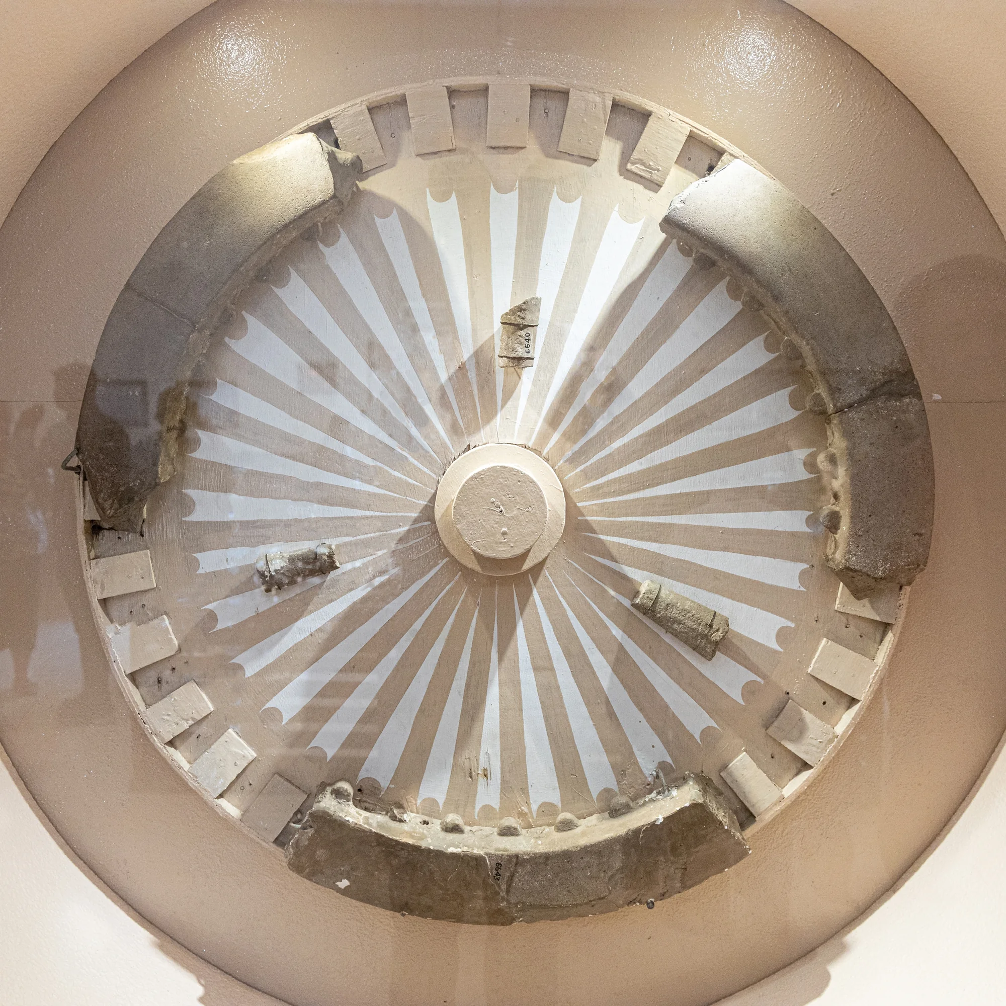 The Dharmachakra wheel that originally topped the Lion Capital