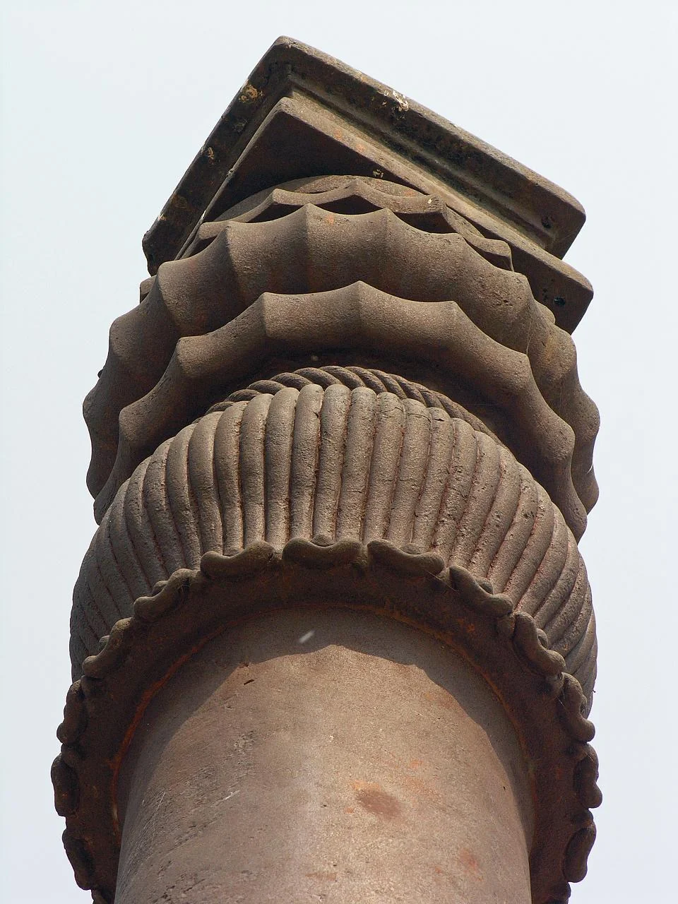 Close-up of the decorative capital at the top of the Iron Pillar
