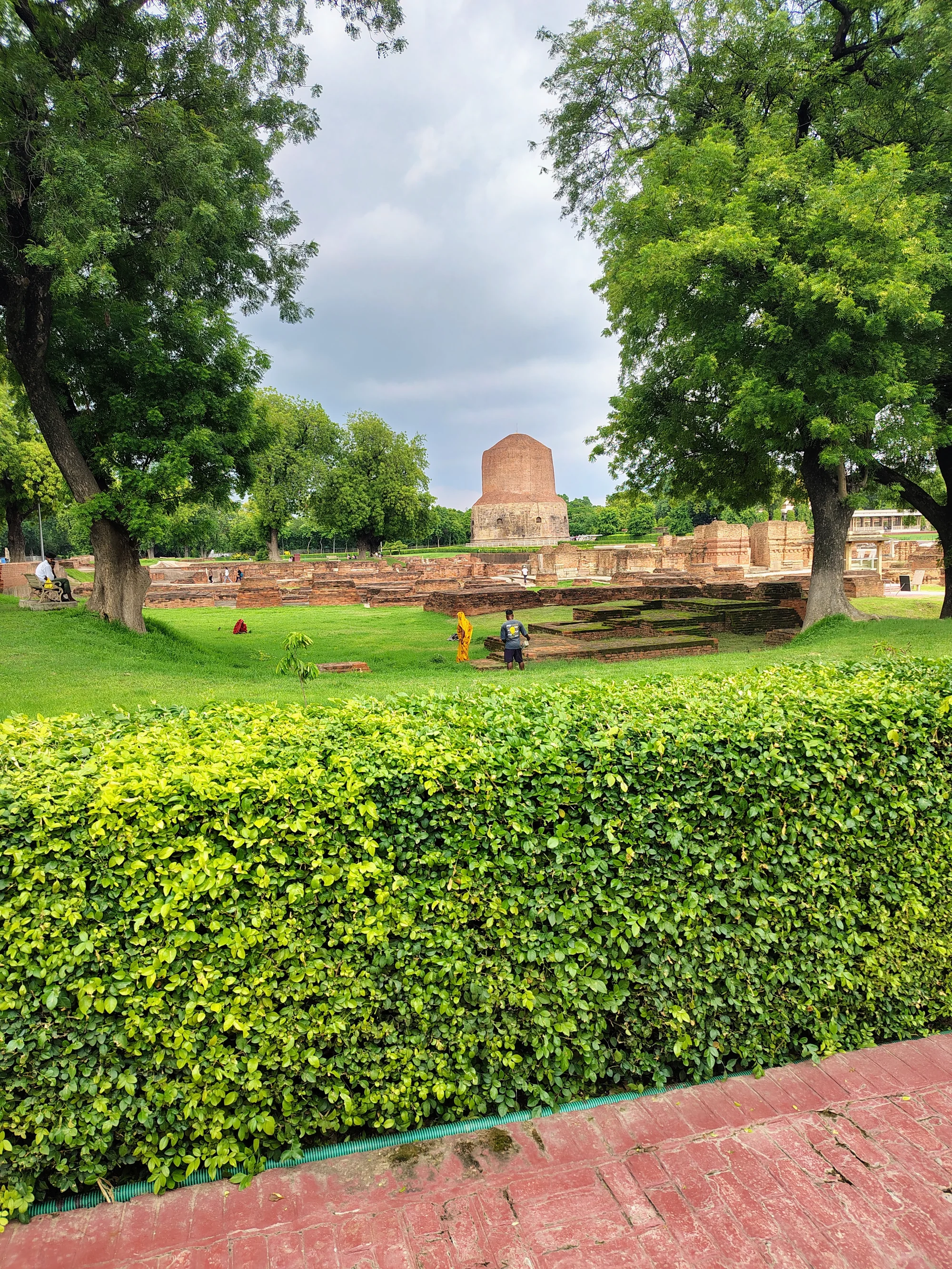 Dhamek Stupa with surrounding Buddhist ruins