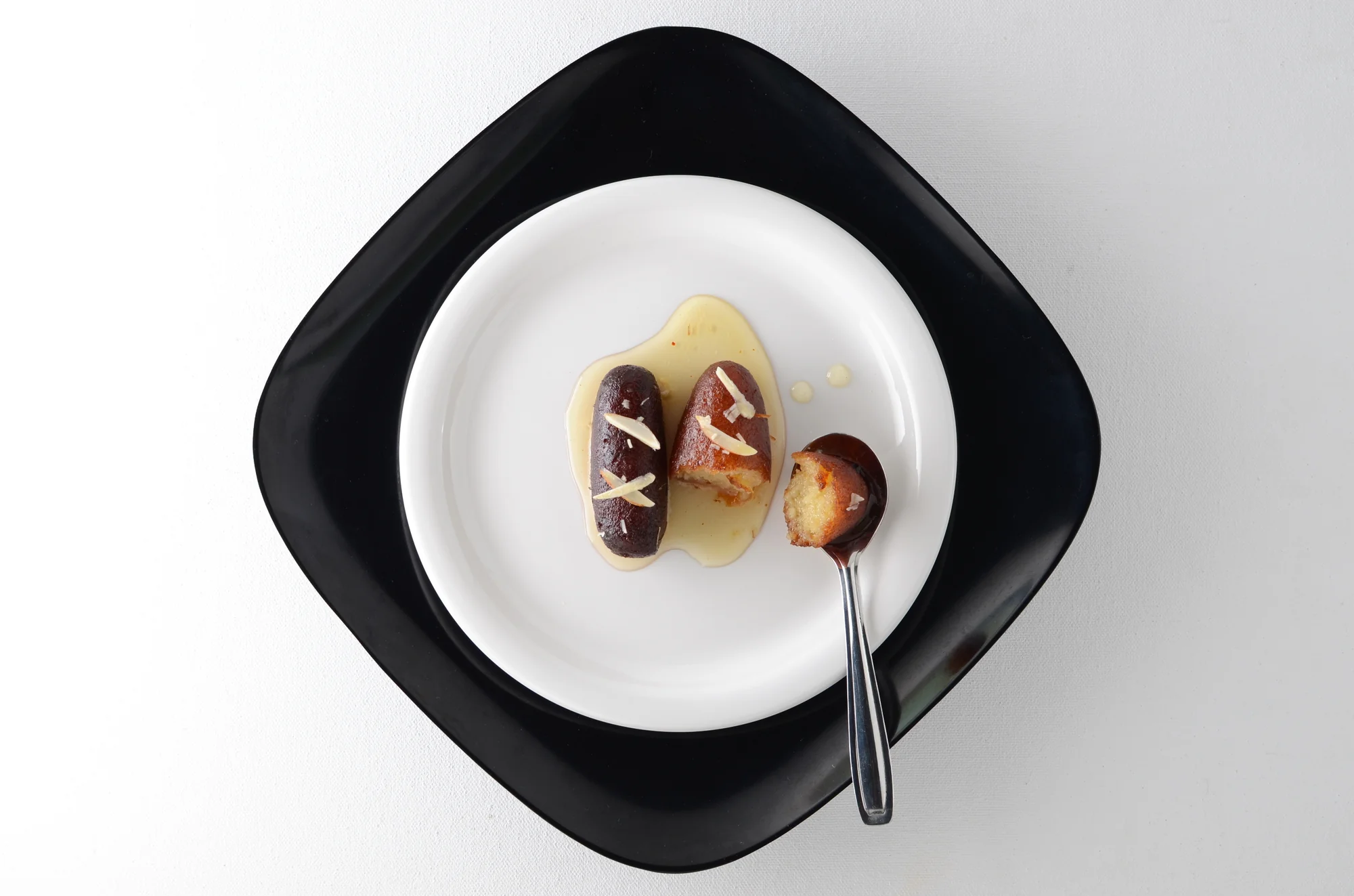 Kala jamun, darker variation of gulab jamun