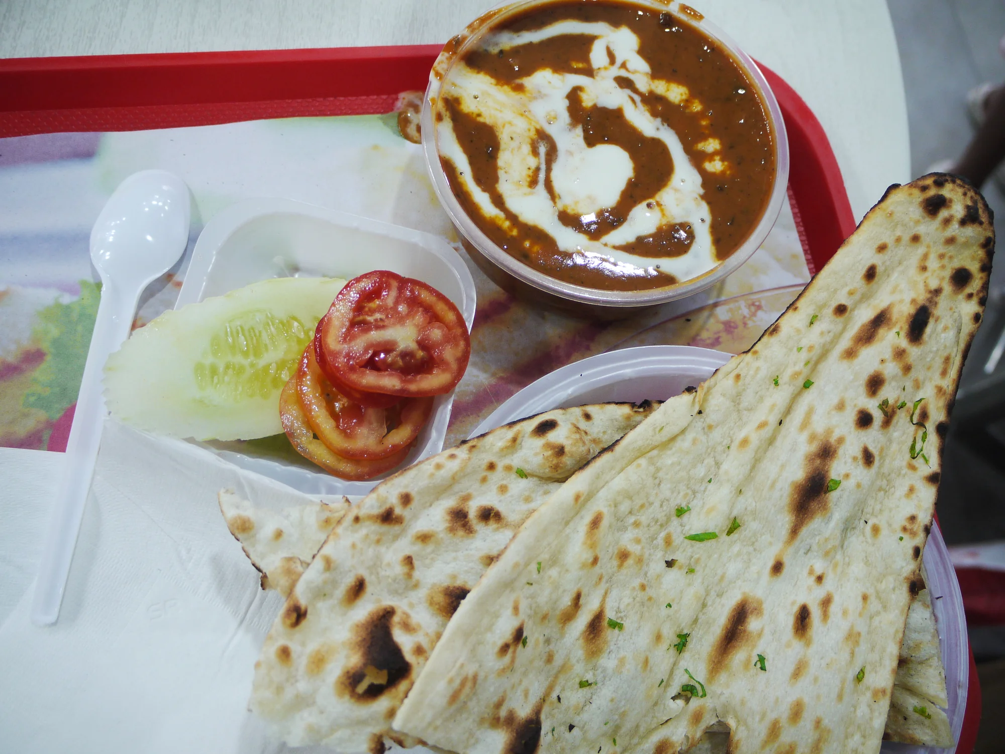 Dal Makhani served with naan bread
