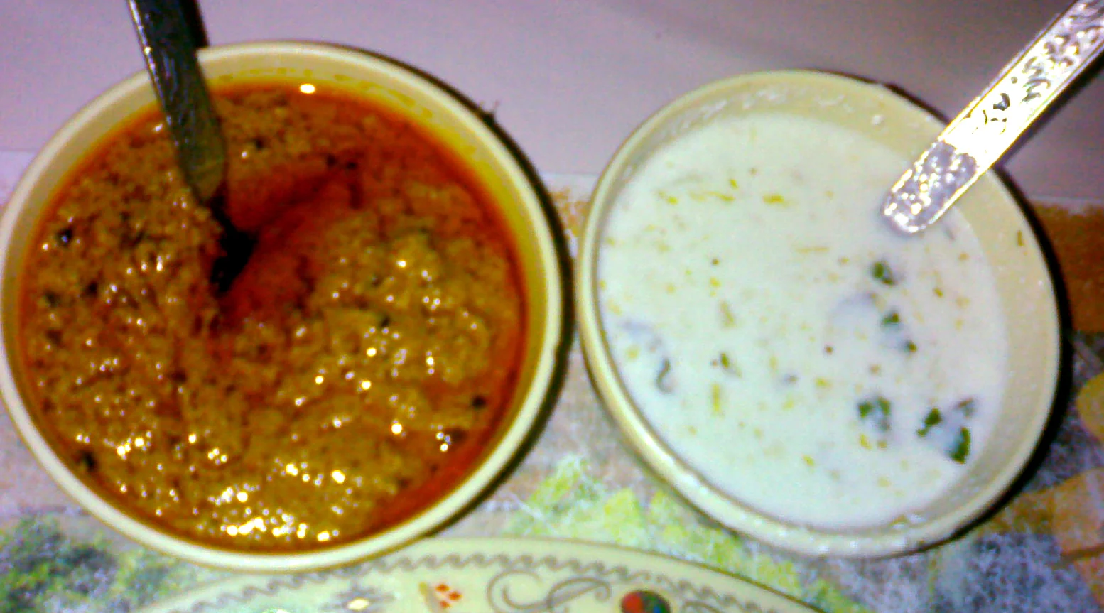 Traditional accompaniments Mirchi Ka Salan and yogurt chutney