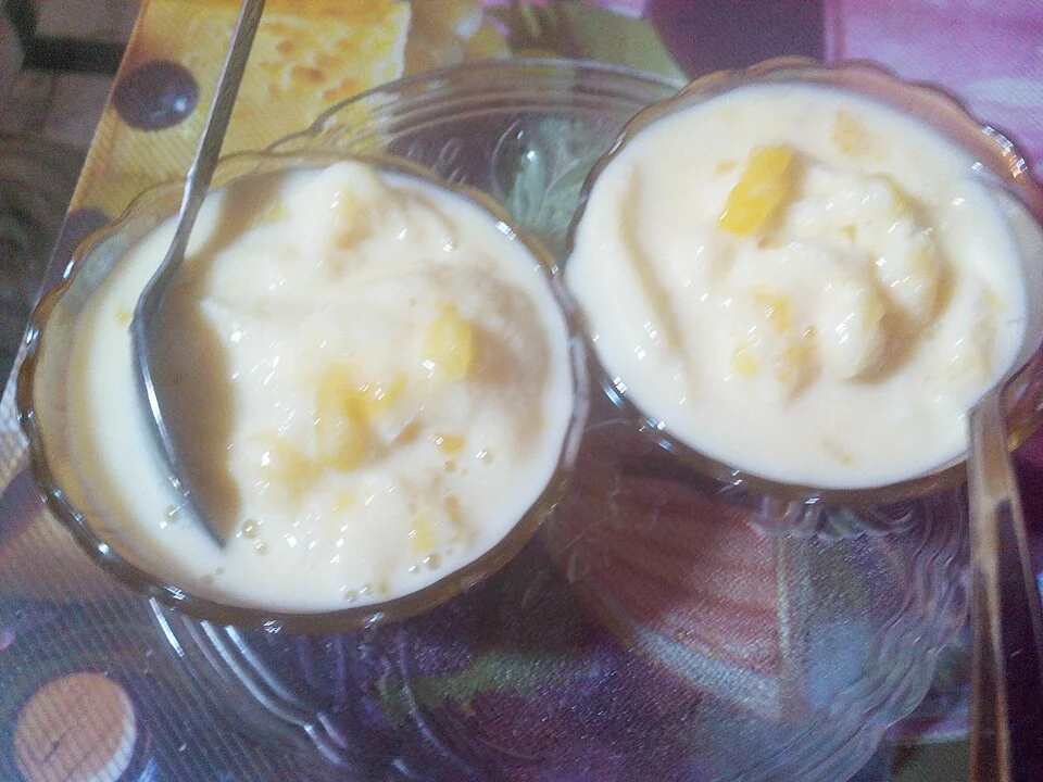 Mango kheer in a white bowl