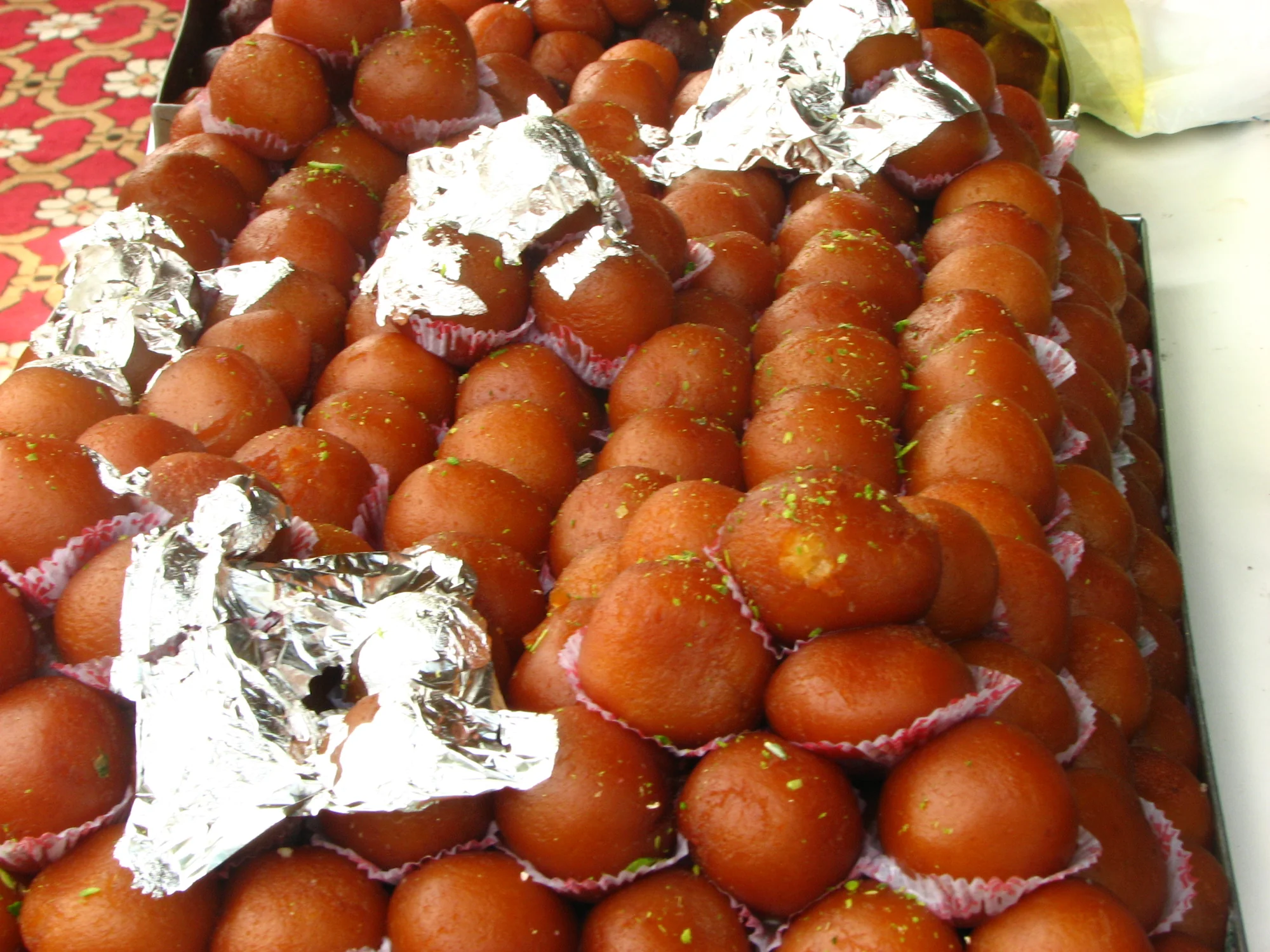 Gulab jamun served in Delhi sweet shop