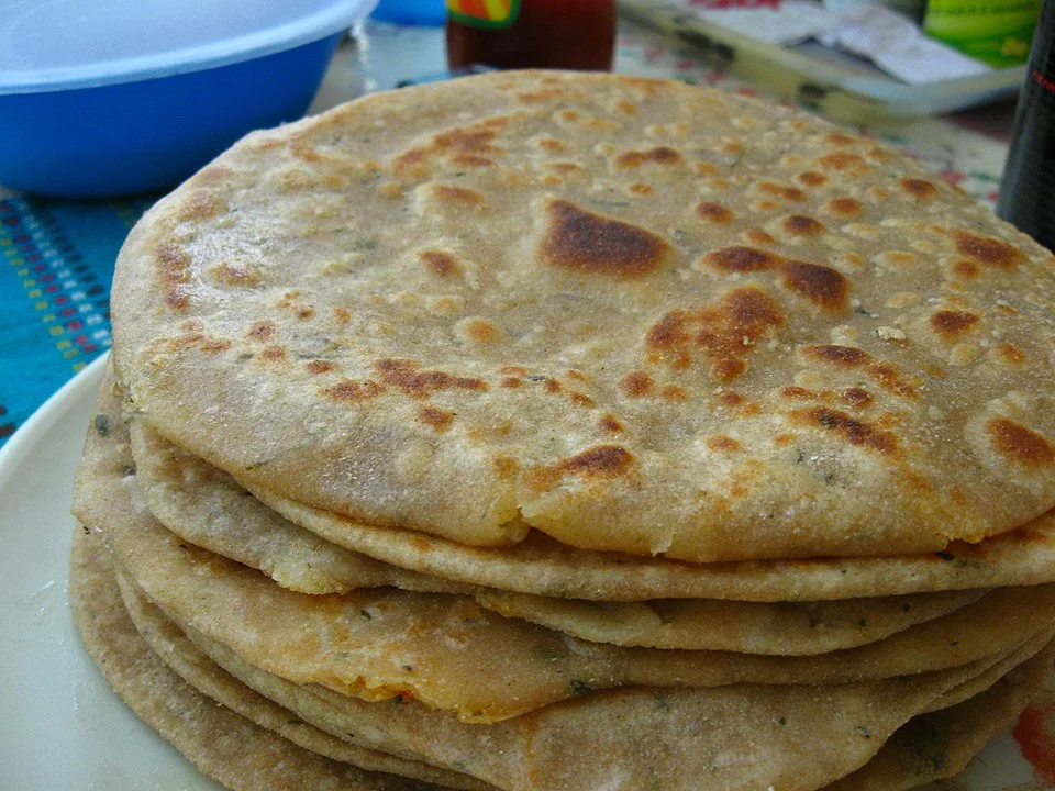 Close-up of aloo paratha showing the golden-brown surface