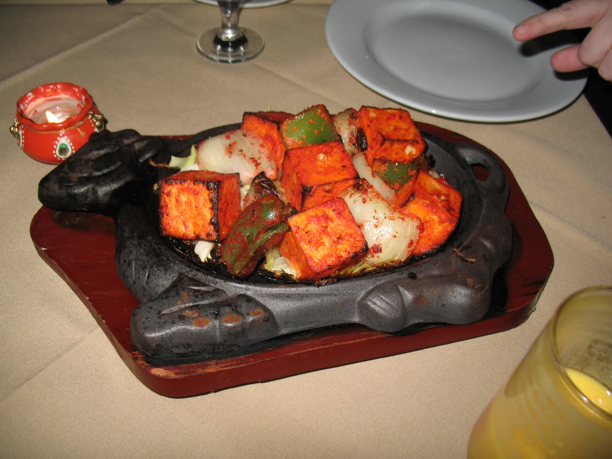 Restaurant-style paneer tikka platter with accompaniments
