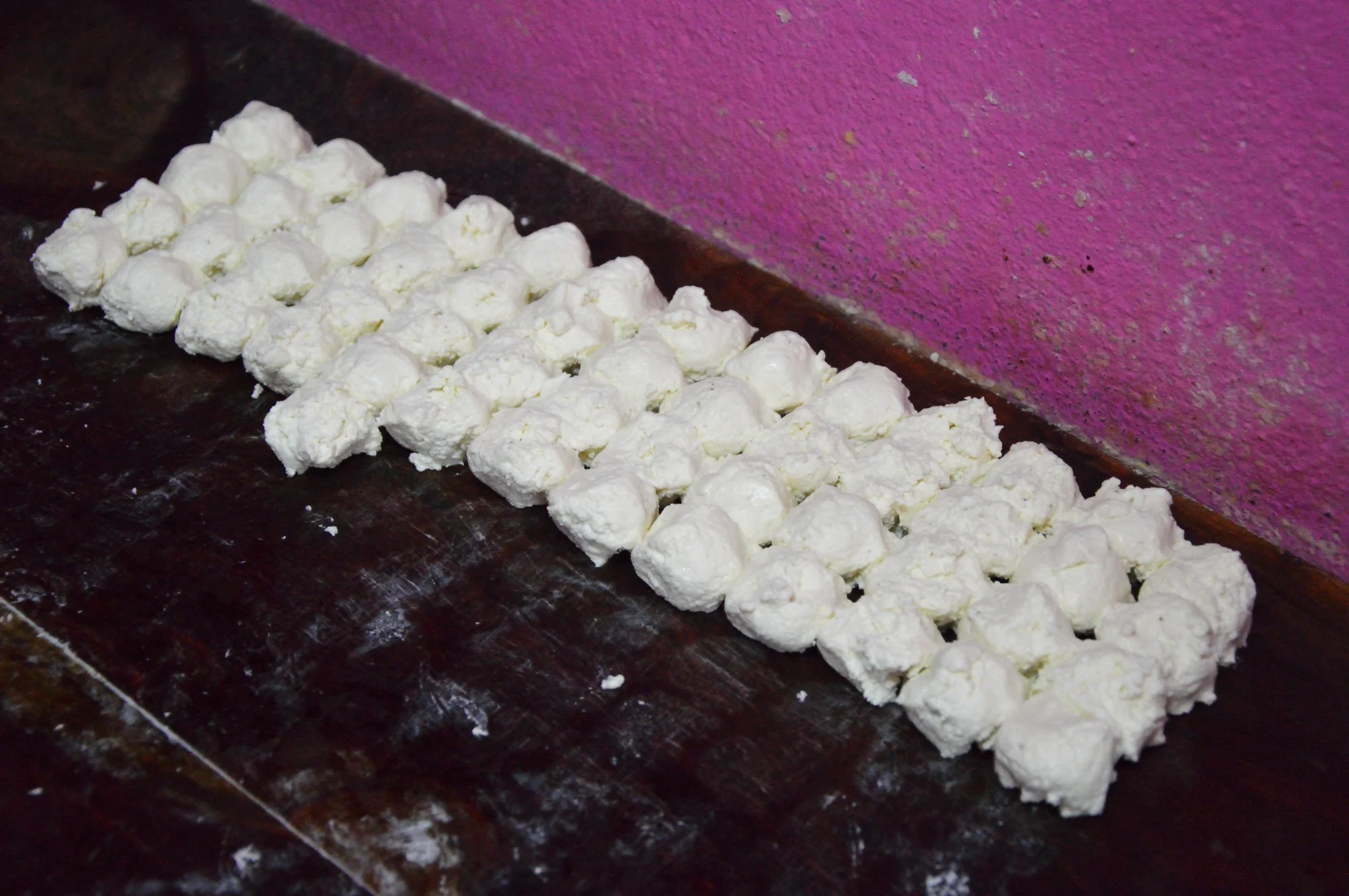 Divided chhena portions for rasgulla preparation