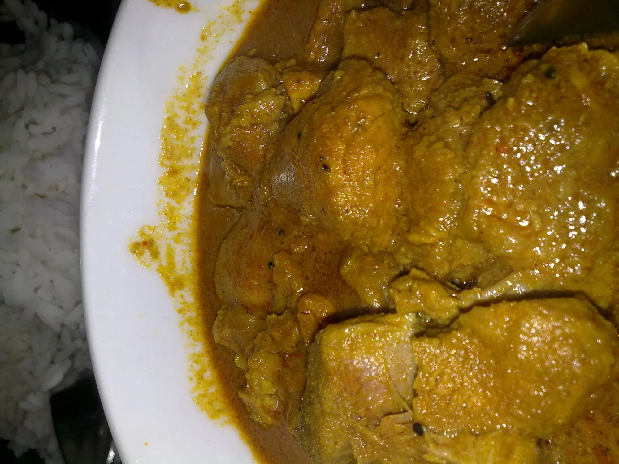 Traditional vindalho served in Lisbon showing Portuguese-style presentation