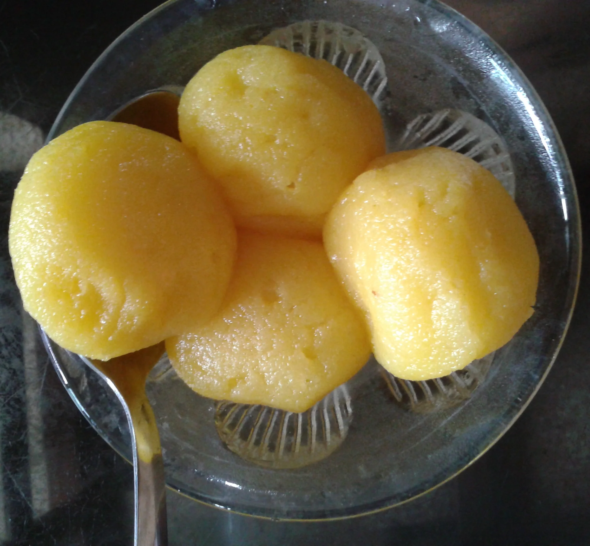 Orange-colored rasgulla variant