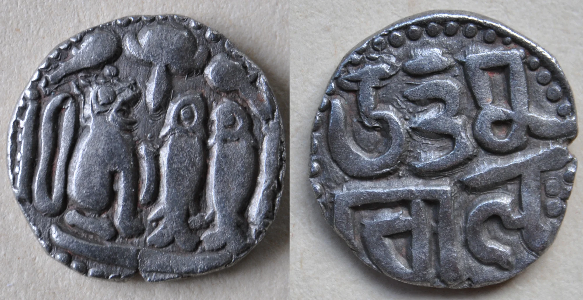 Ancient Chola coin with the legend Uttama