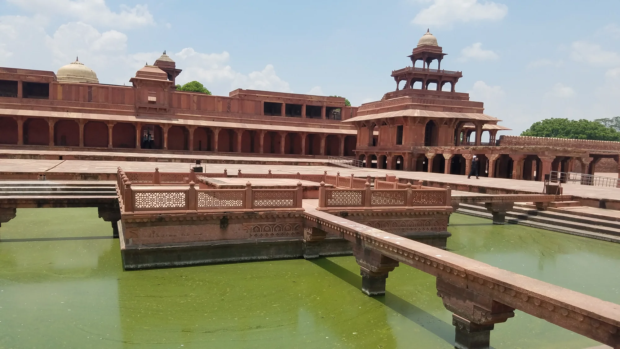 Panoramic view of Fatehpur Sikri showing red sandstone structures against blue sky