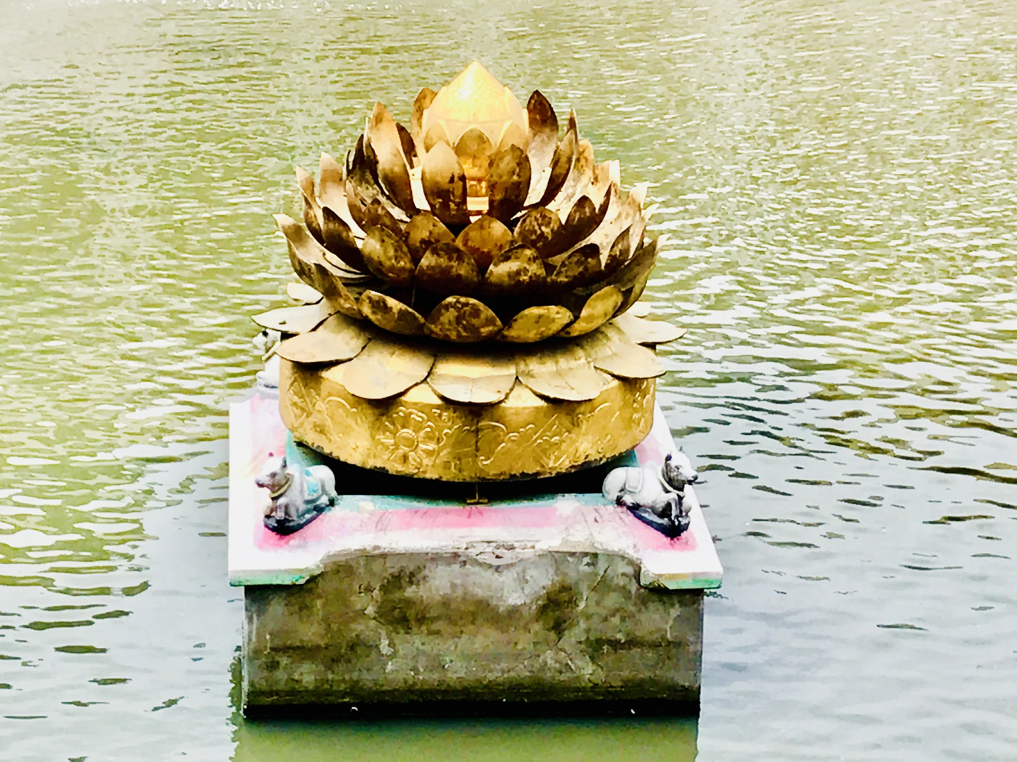 The sacred Golden Lotus Pond within the temple complex