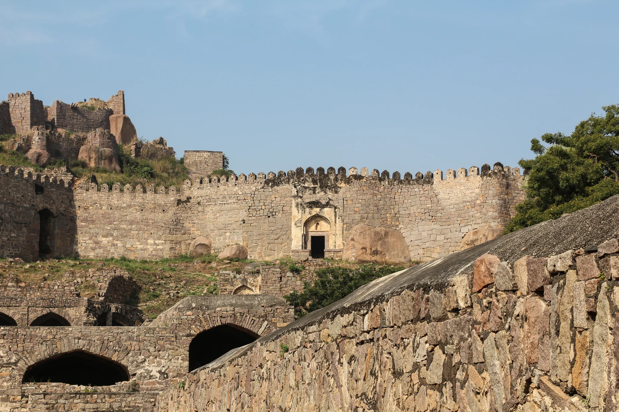 Detailed view of stone masonry and architectural features at Golconda