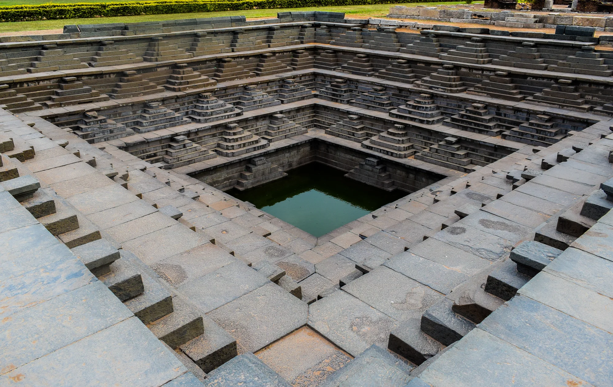 Elaborate stepped well architecture showing geometric precision and water conservation design
