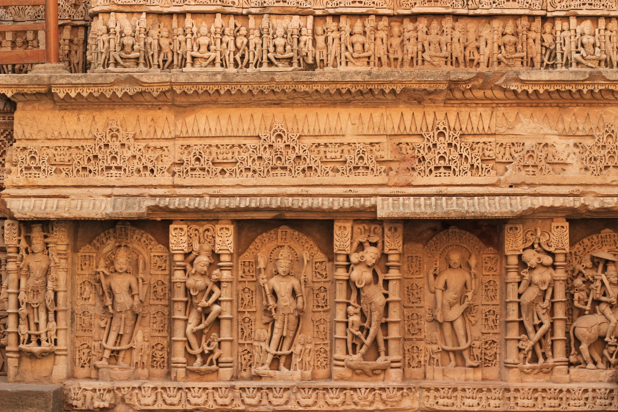 Interior view of the stepwell showing multiple levels and carved niches