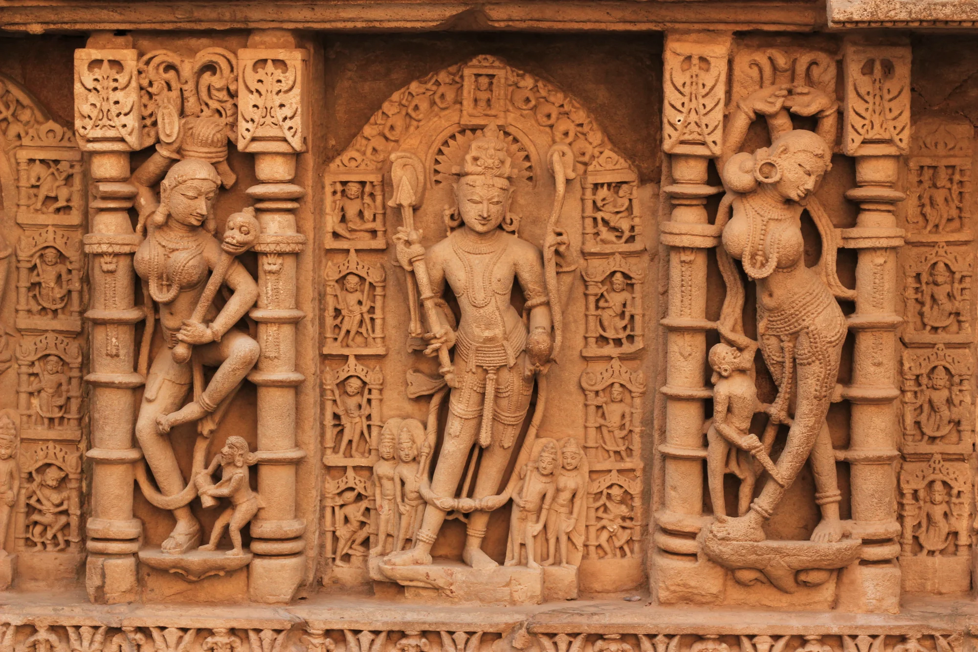 Intricate wall carvings showing geometric and floral patterns