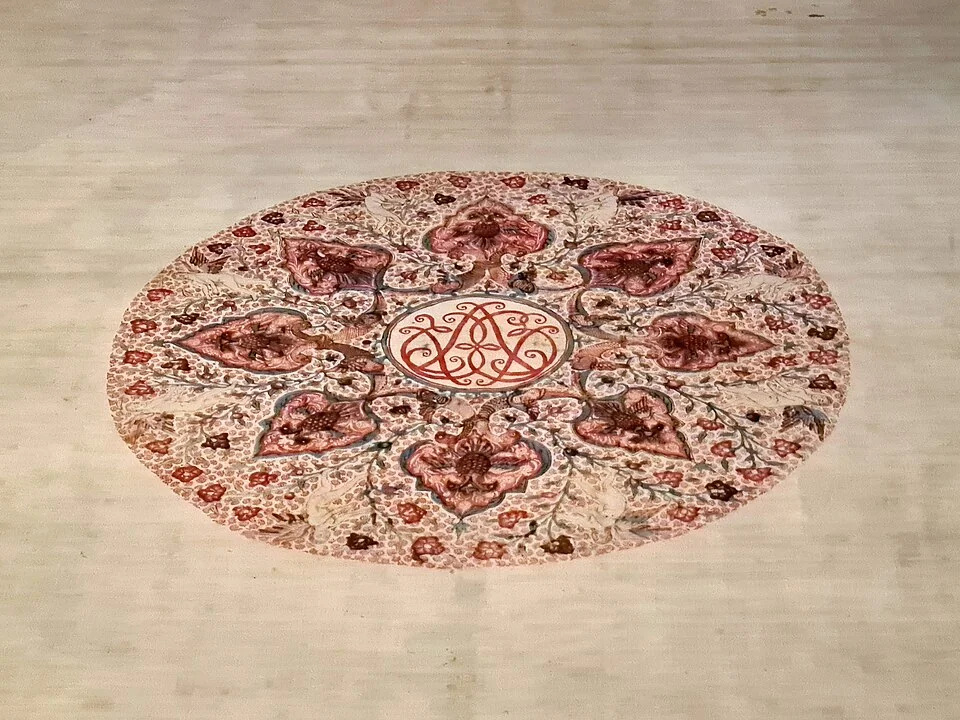 Detailed view of Coromandel textile with monogram